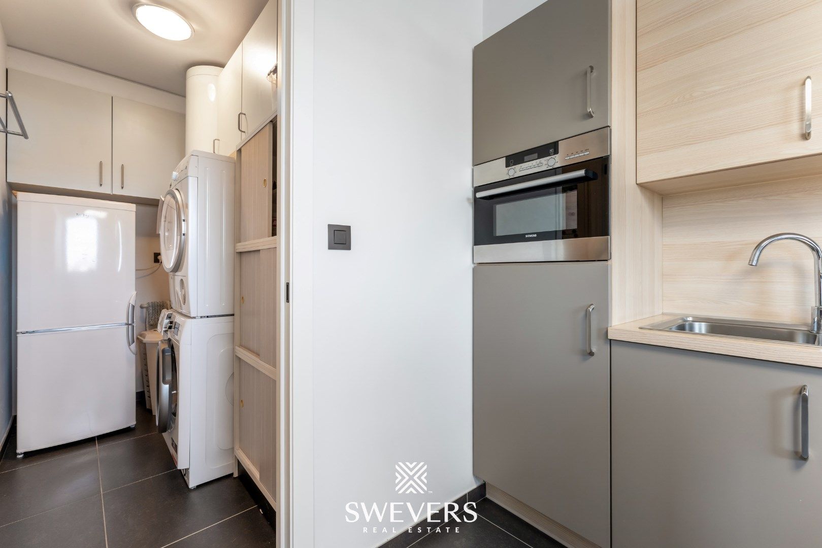 Comfortabel wonen met ruim Terras, 2 Slaapkamers, parkeerkelder & berging foto 16