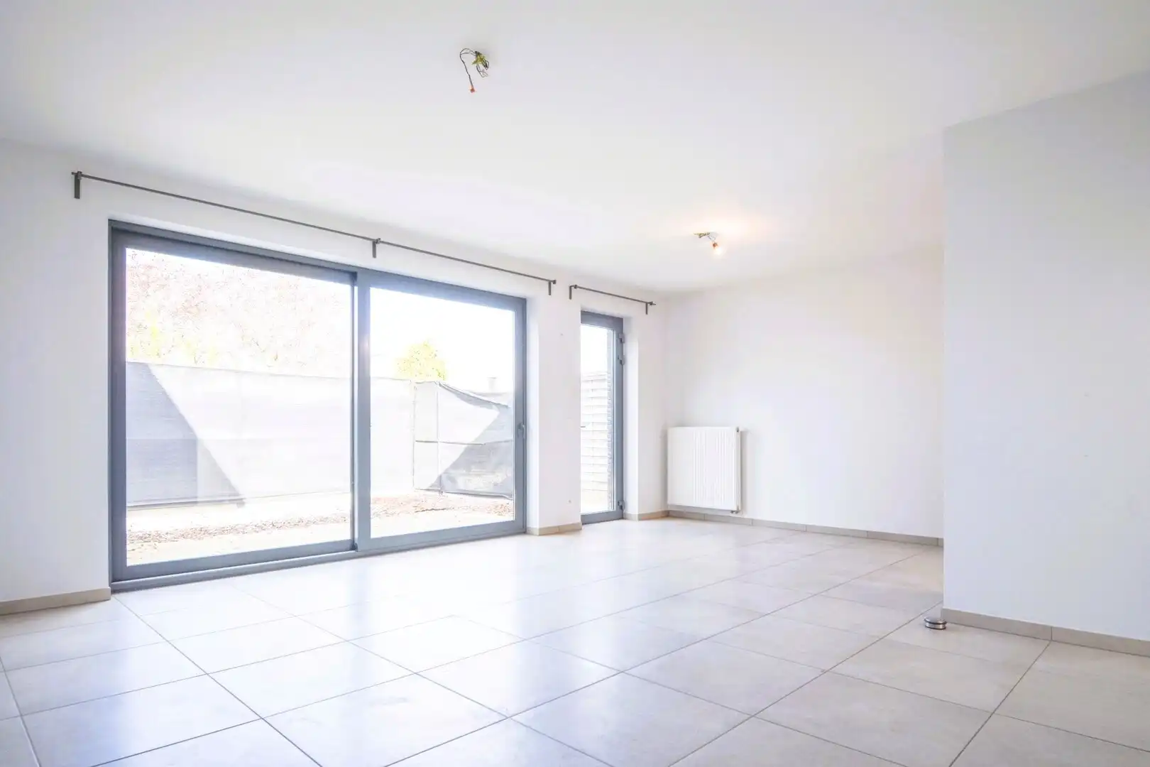 Gelijkvloerse woning in centrum Westrozebeke - ideaal als investering of voor eigen bewoning foto 2