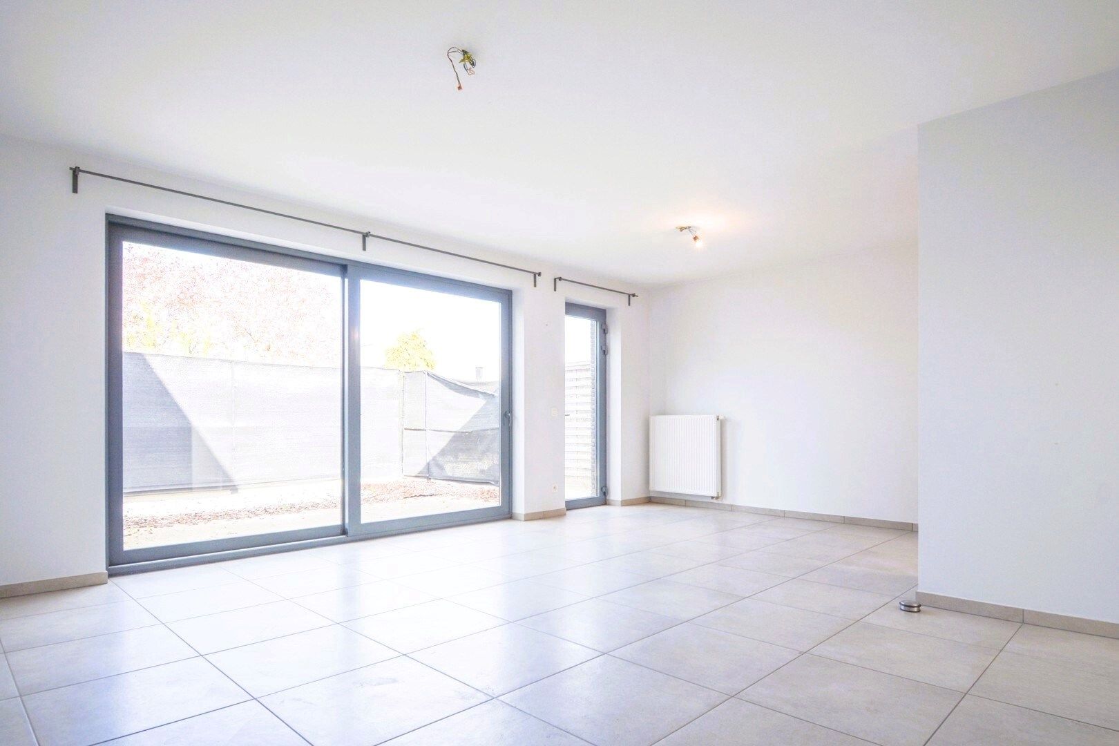 Gelijkvloerse woning in centrum Westrozebeke - ideaal als investering of voor eigen bewoning foto 2