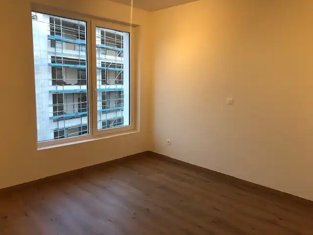 APPARTEMENT MET TERRAS EN AUTOSTAANPLAATS TE HUUR IN MOERBEKE foto 9