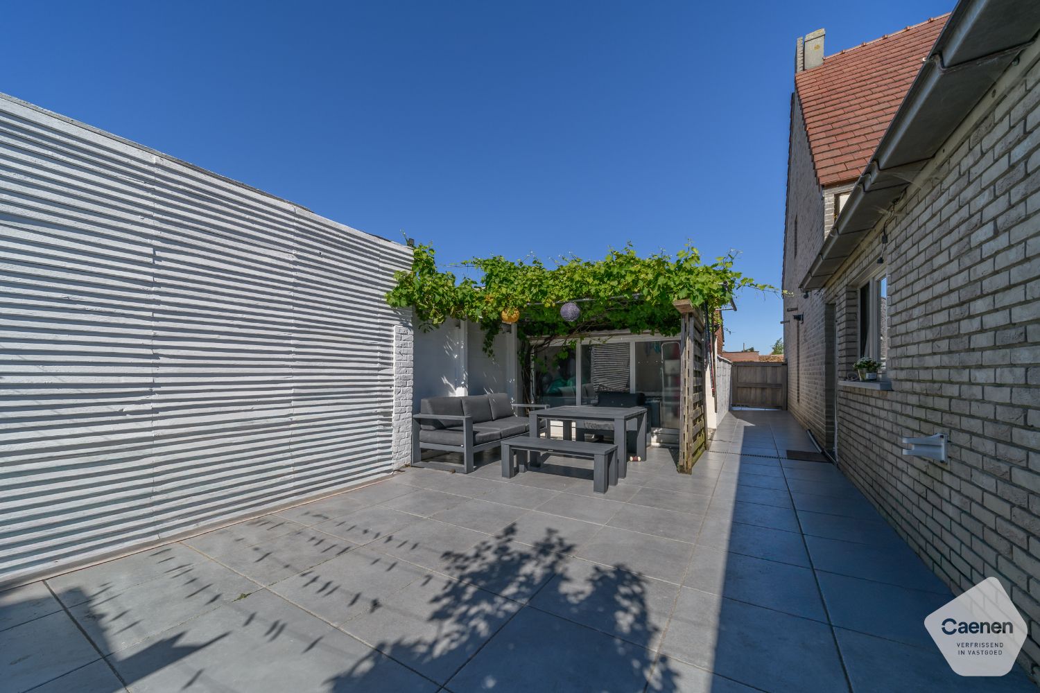 Ontdek deze ruime en gezellige rijwoning met een uiterst centrale ligging! foto 9