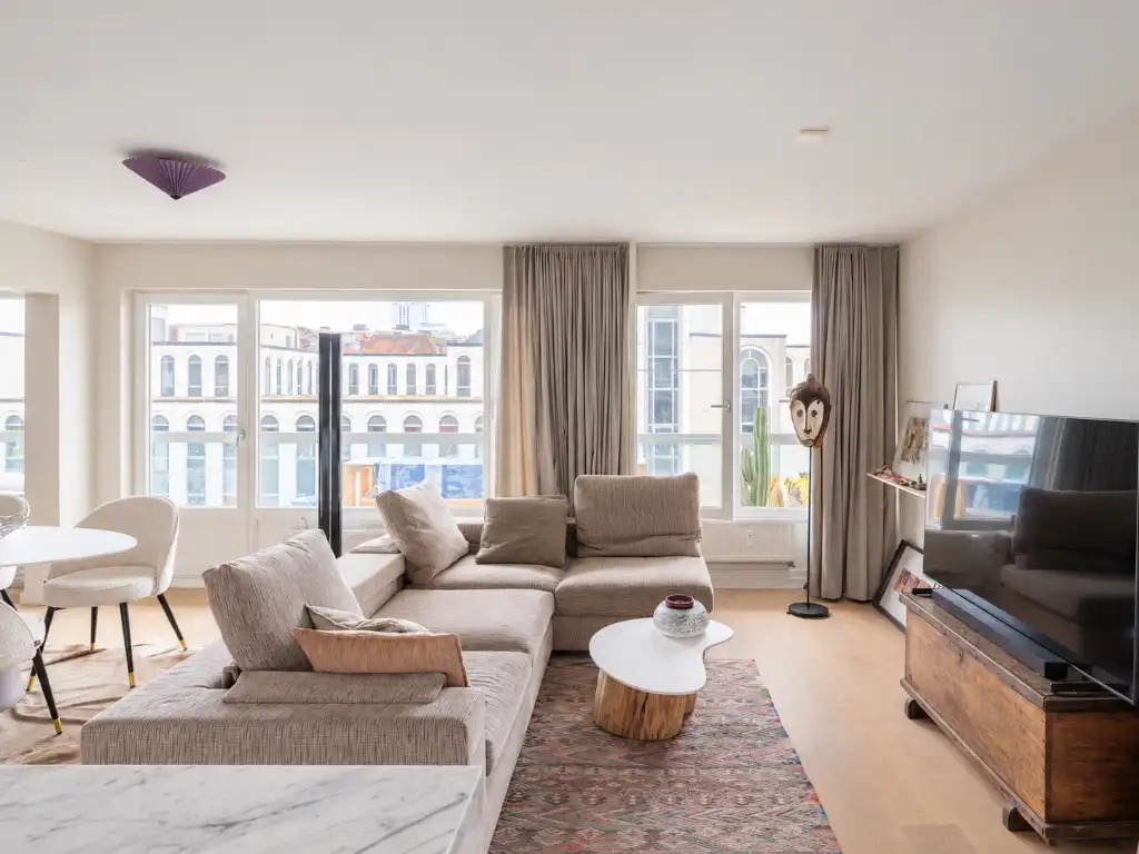 Toplocatie aan de Kouter. Wonen aan het water in een aangenaam appartement met terras. foto 4