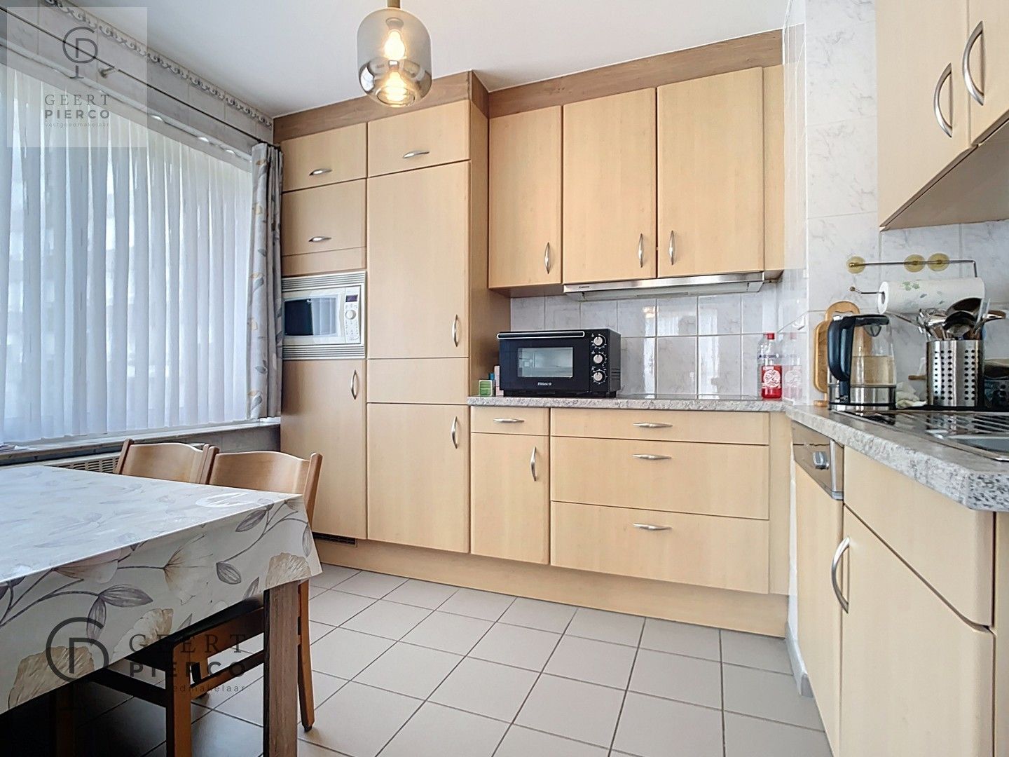 Gerenoveerd tweeslaapkamer appartement vlakbij stadscentrum met (mogelijkheid tot aankoop van) garagebox. foto 11