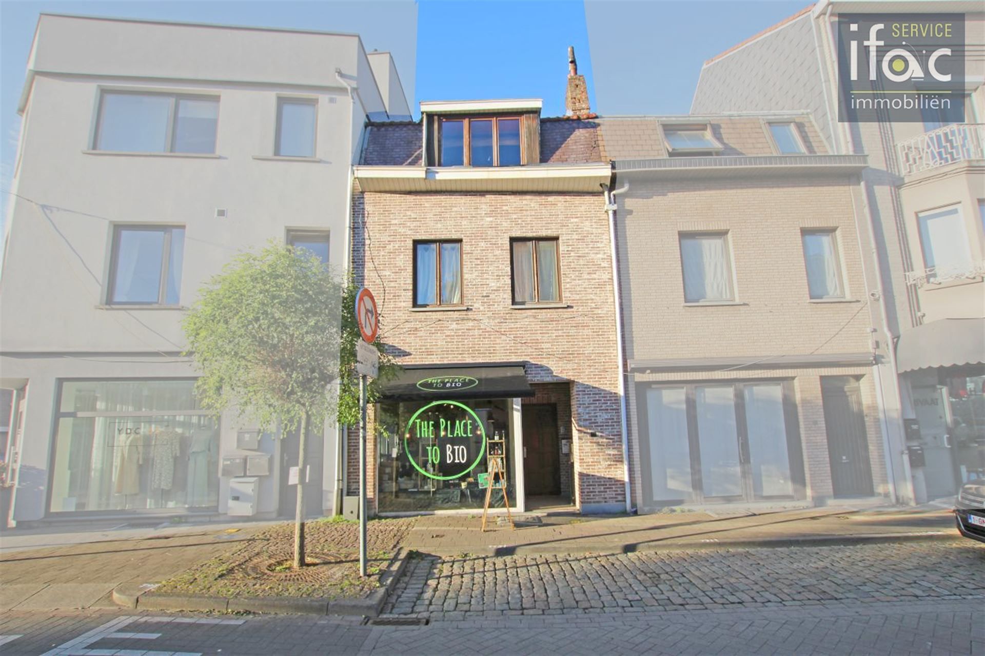 Opbrengsteigendom met 2 flats en handelsruimte Tervuren foto {{pictureIndex}}