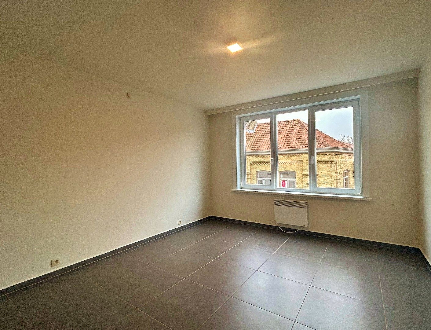 Lichtrijk en gerenoveerd appartement in het centrum van Ieper  foto 7
