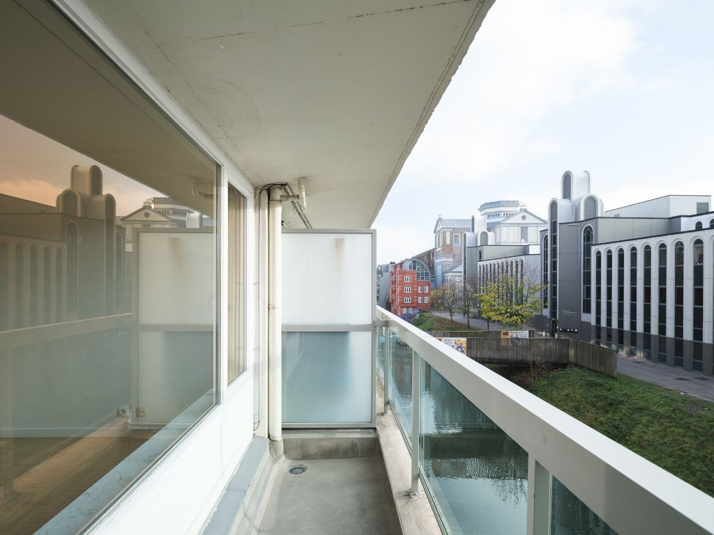 Lichtrijk 3-slaapkamer appartement met zicht op de Ketelvest foto 3