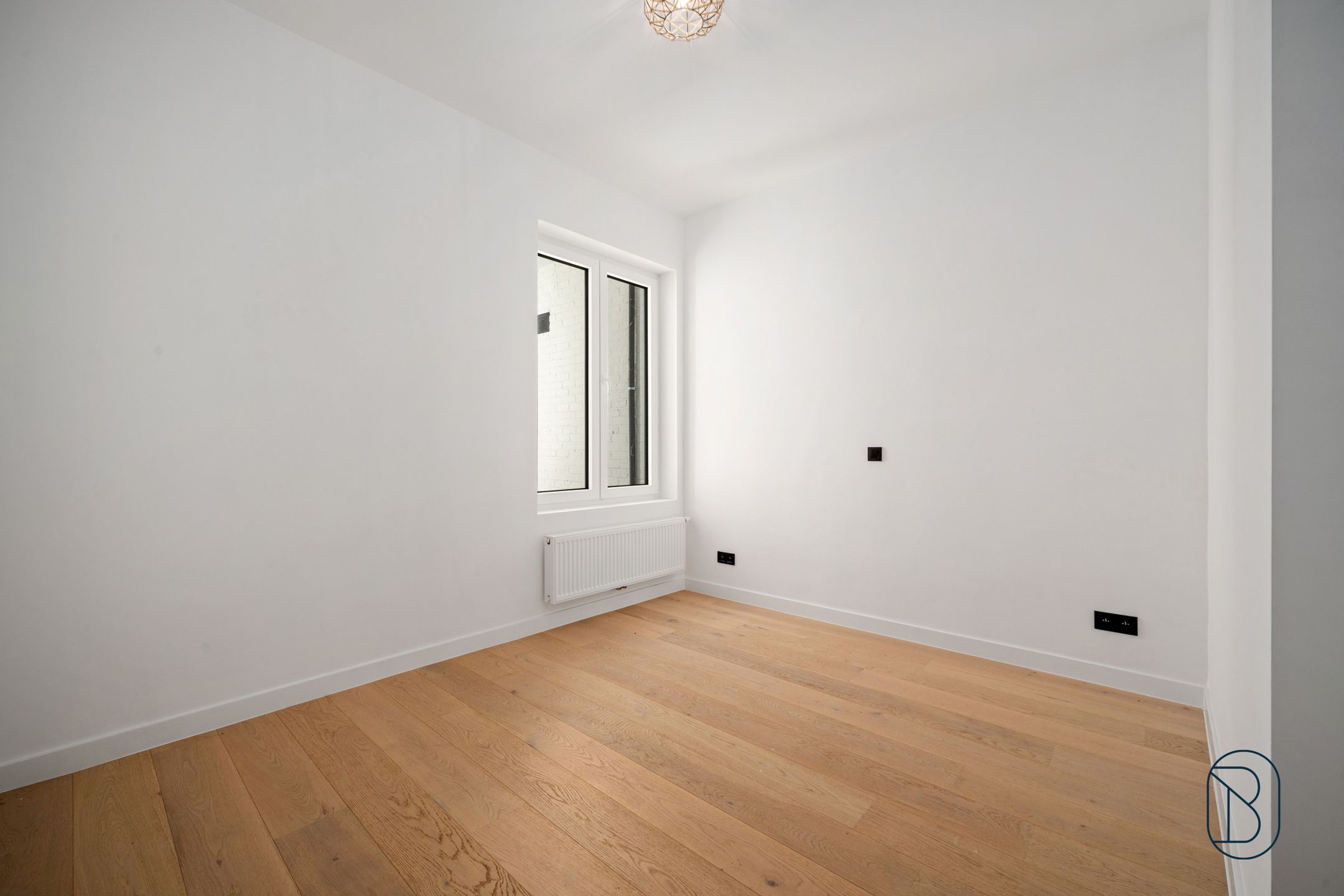 Gerenoveerd appartement met stadstuin en garage in Wevelgem foto 11