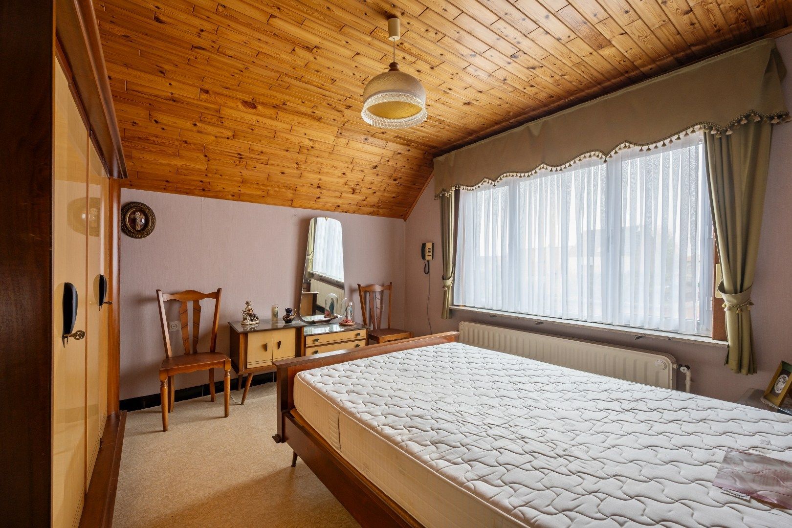 Op te frissen woning met 3 slaapkamers, garage en tuin. foto 16