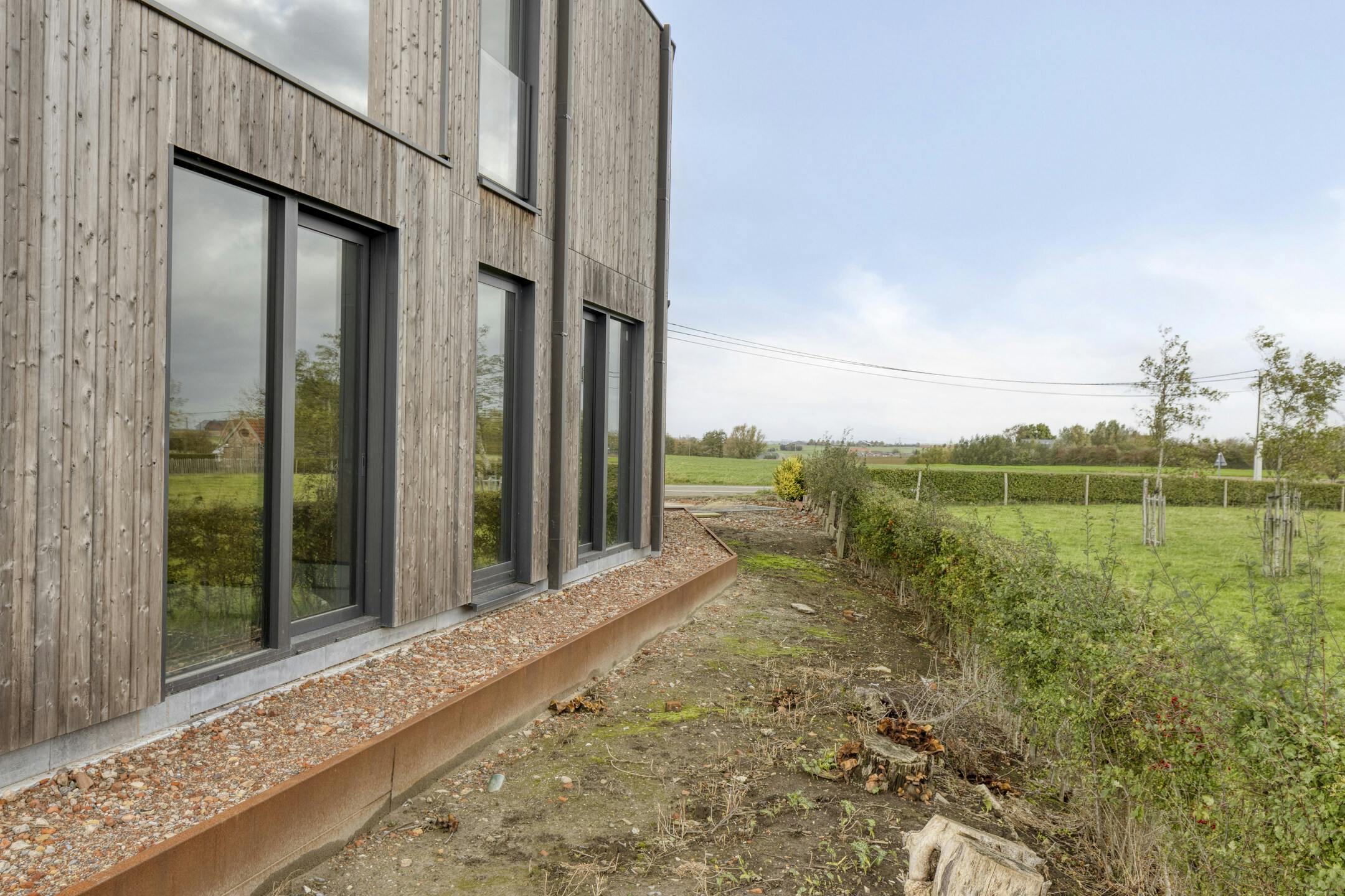 Moderne houtskeletwoning met panoramisch uitzicht foto 27