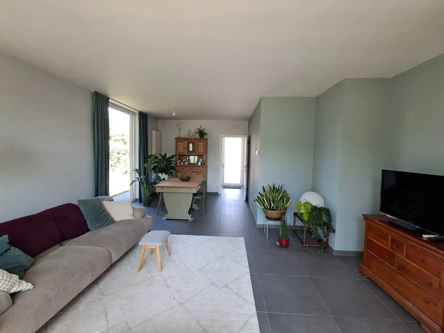 Instapklare halfopen woning met ruime zonnige tuin te Oedelem! foto 4