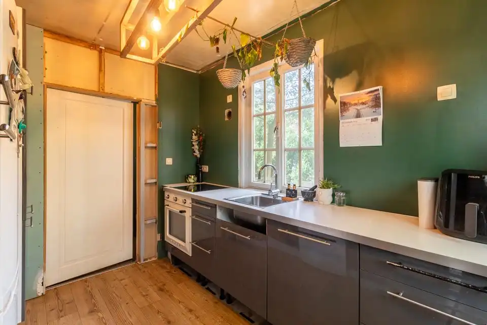 Te renoveren open bebouwing in een groene oase foto 8