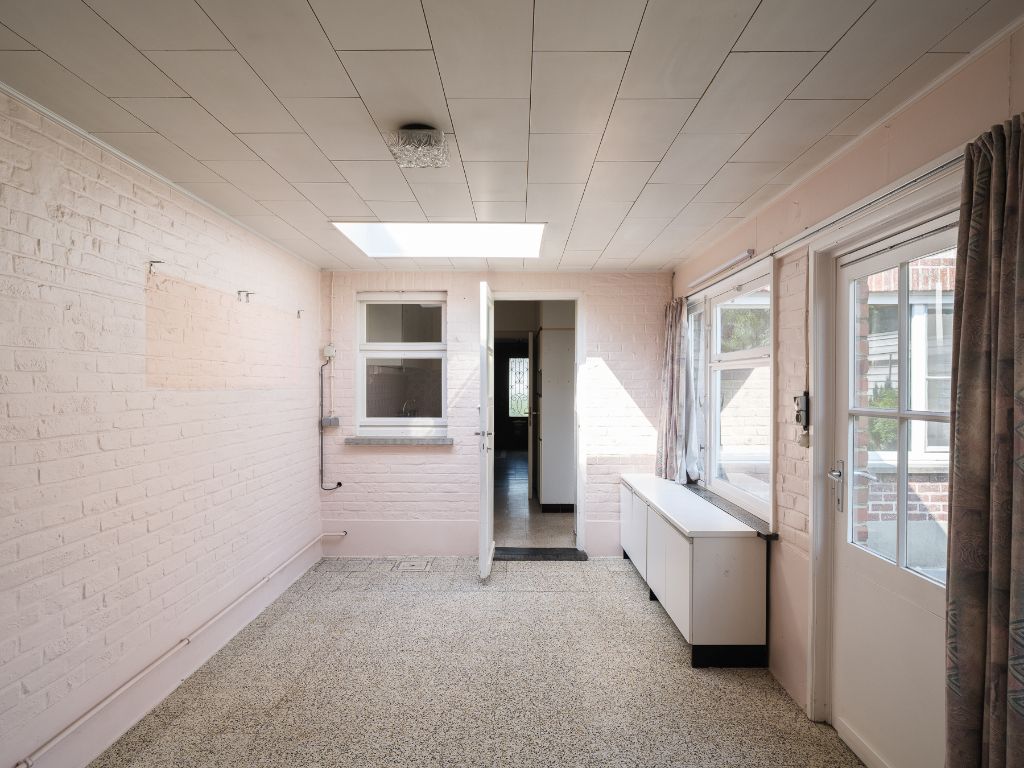 Toplocatie – Te renoveren halfopen bebouwing met bijzonder veel potentieel op een zuidgericht perceel van 576 m² te Sint-Martens-Latem foto 11