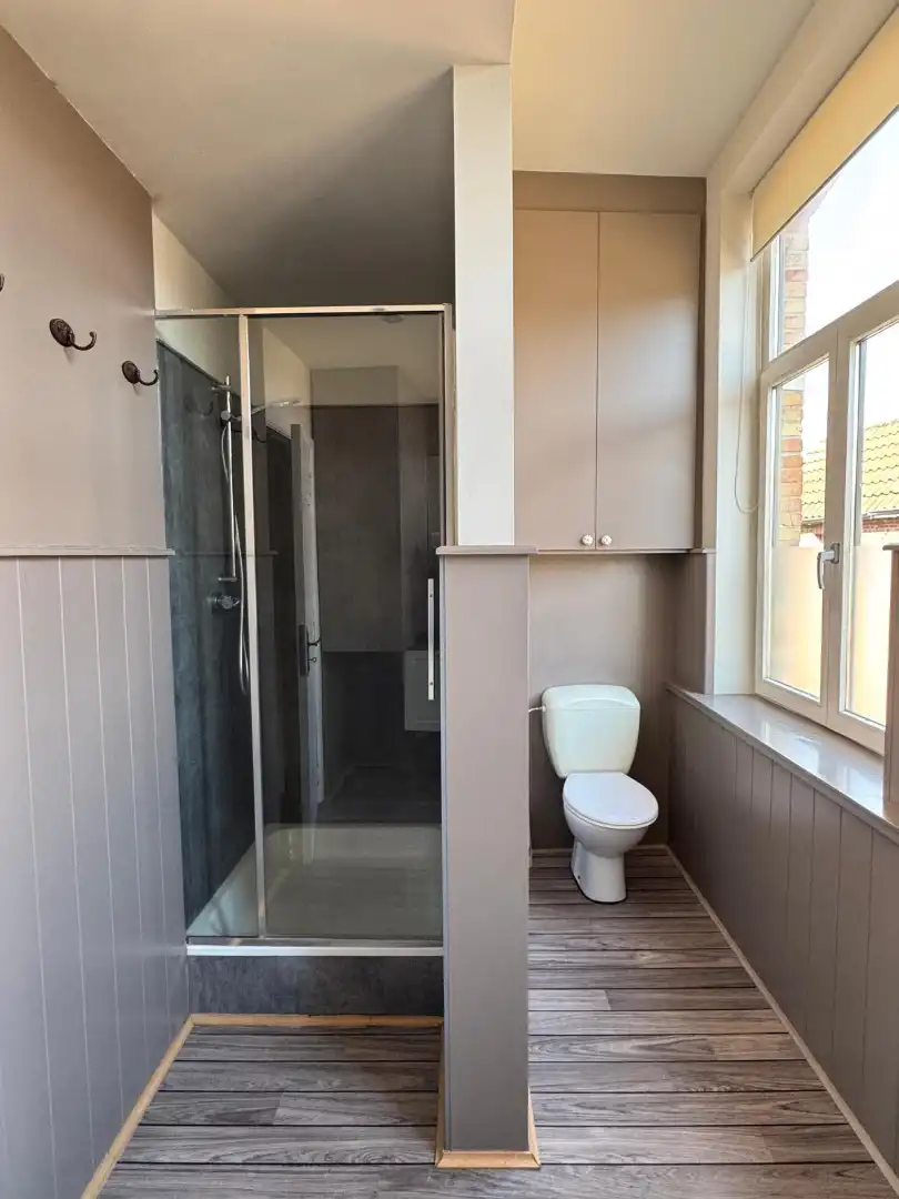 Instapklare trapgevelwoning met zonnig terrastuintje en grote berging, centrum, rustige straat omgeving ’t Zand foto 12