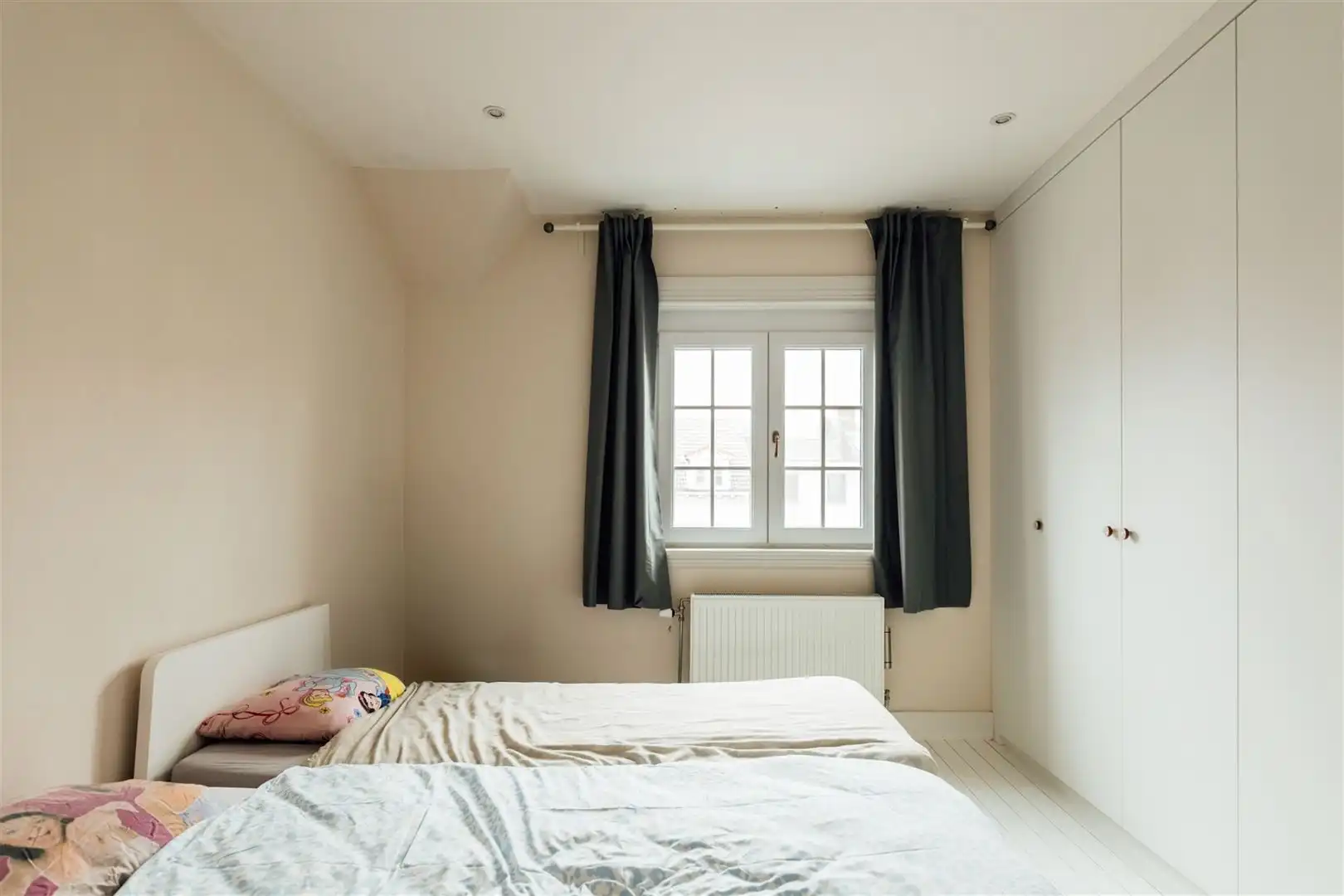 Opbrengsteigendom met praktijk en duplex appartement foto 16