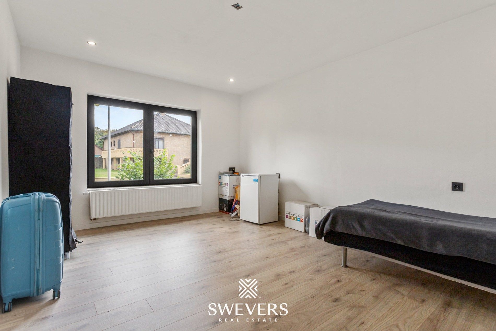 Volledig gerenoveerde gezinswoning met garage en tuin te Genk foto 18