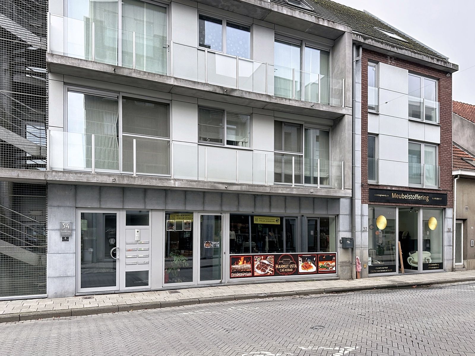 Commercieel pand in winkelcentrum Aartselaar foto {{pictureIndex}}