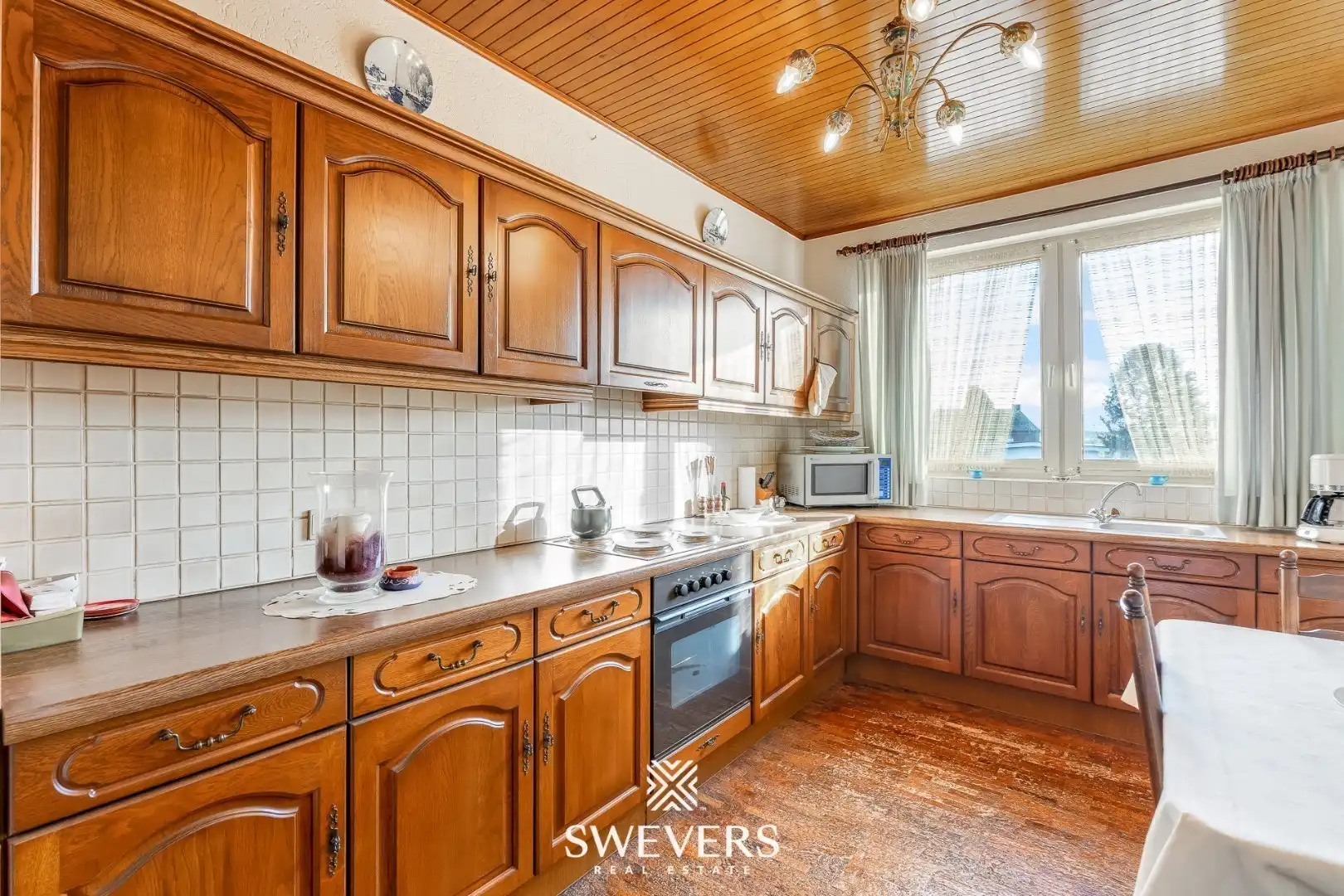 Duplex-appartement met handelsruimte, terras en tuin op toplocatie Riemst foto 8