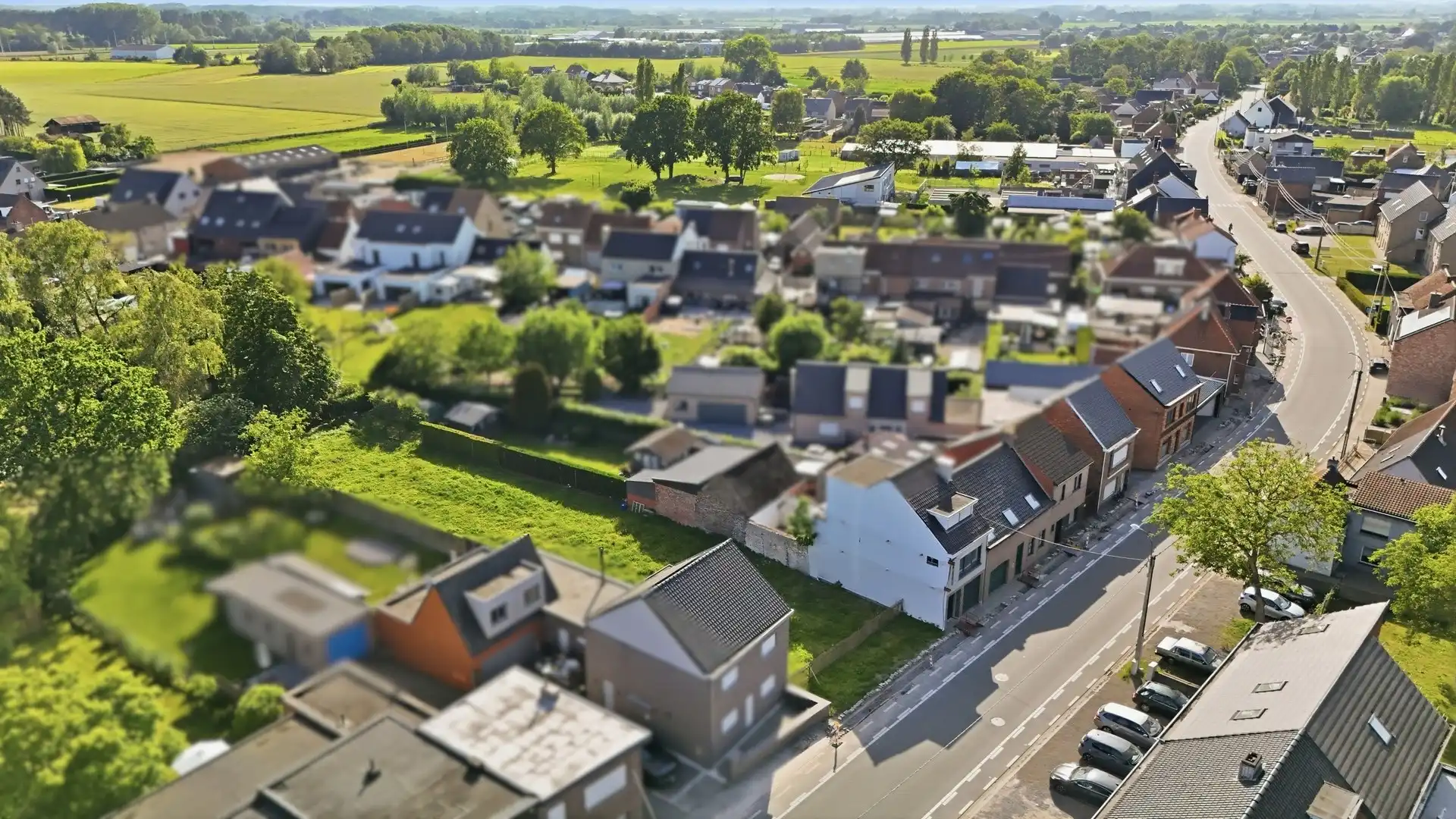 Bouwgrond met vergunde plannen voor 2 woningen foto 2