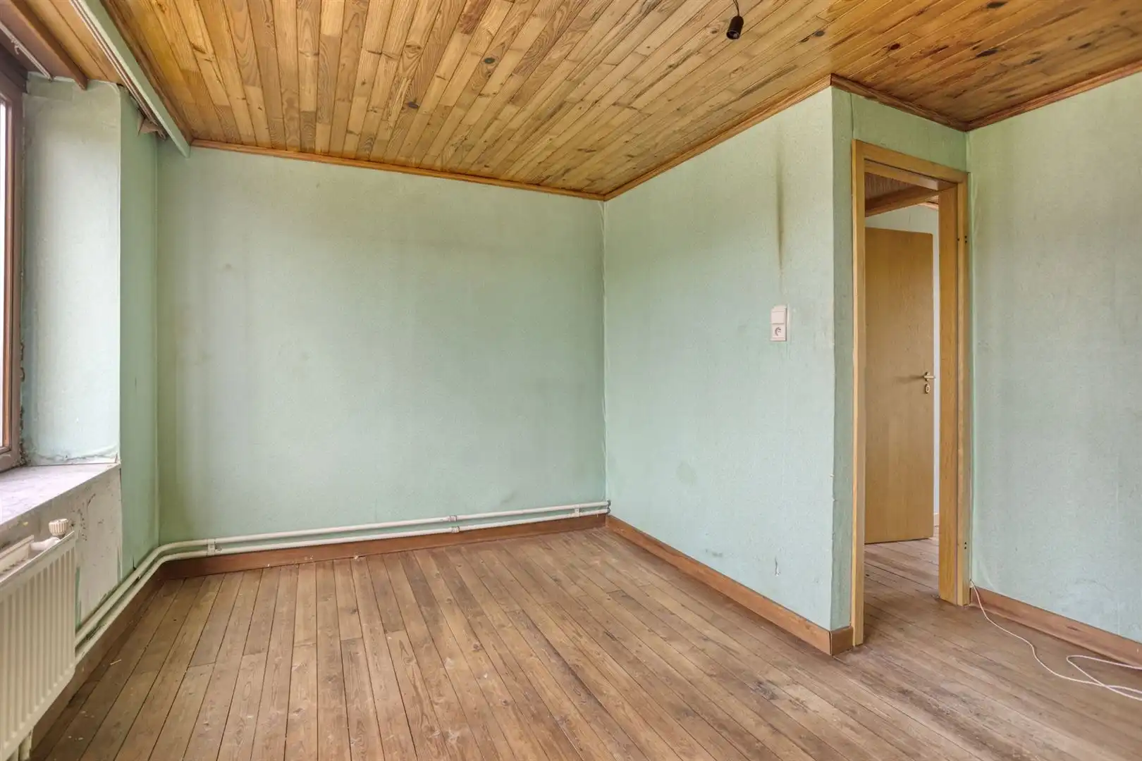 TE KOOP: Te renoveren woning op een perceel van 11a33ca! foto 19