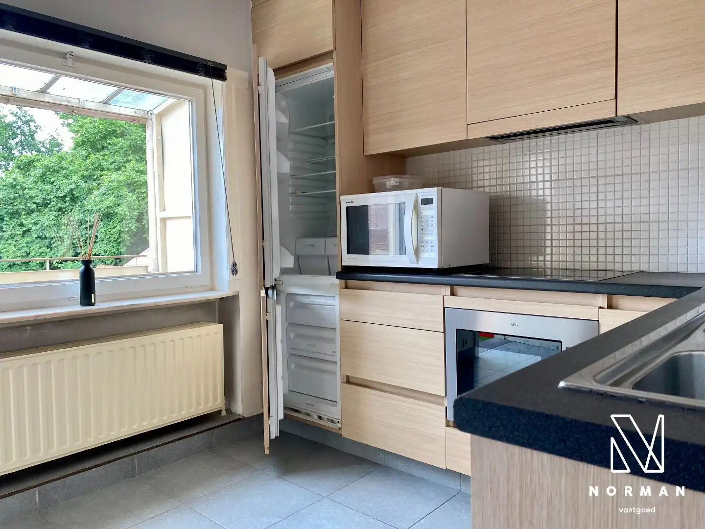 Instapklare bel-etagewoning in Kuurne met zonnig terras foto 3