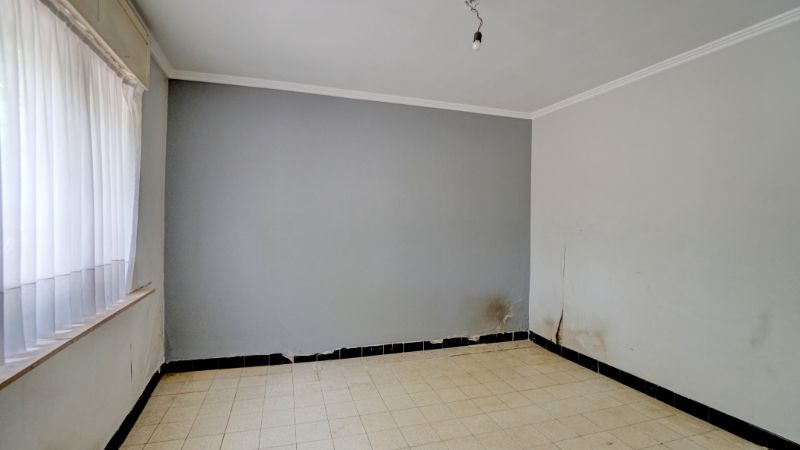 Te renoveren woning in het centrum op 6 are 87 ca foto 9