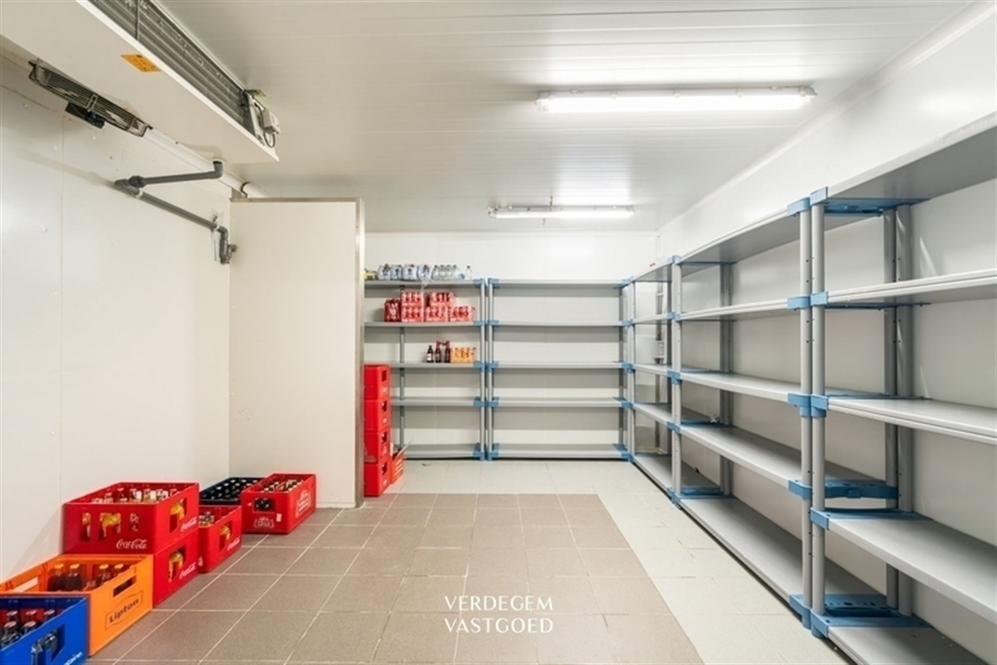 Wonen en werken op een unieke locatie: handelsgelijkvloers met appartement en tuin foto 9