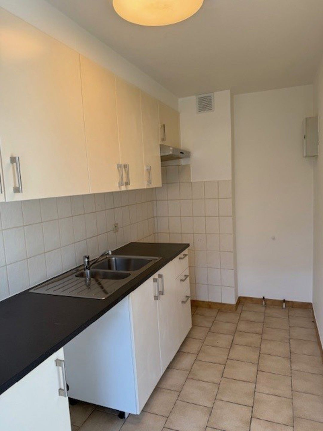 Deels gerenoveerd gelijkvloers appartement. foto 7