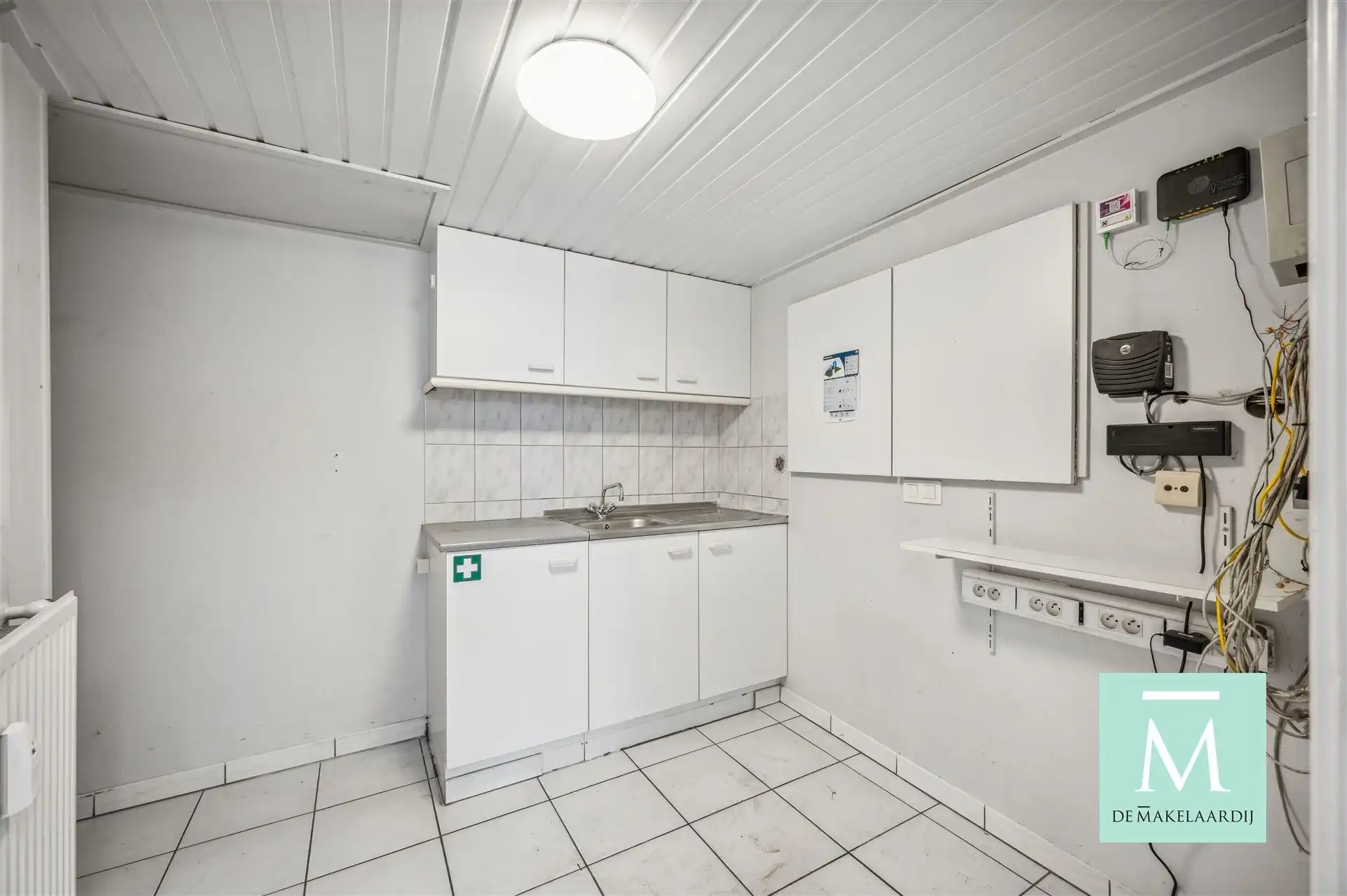 Kantoor/Winkel/handelsruimte te huur gelegen in het hartje van Mechelen foto 5