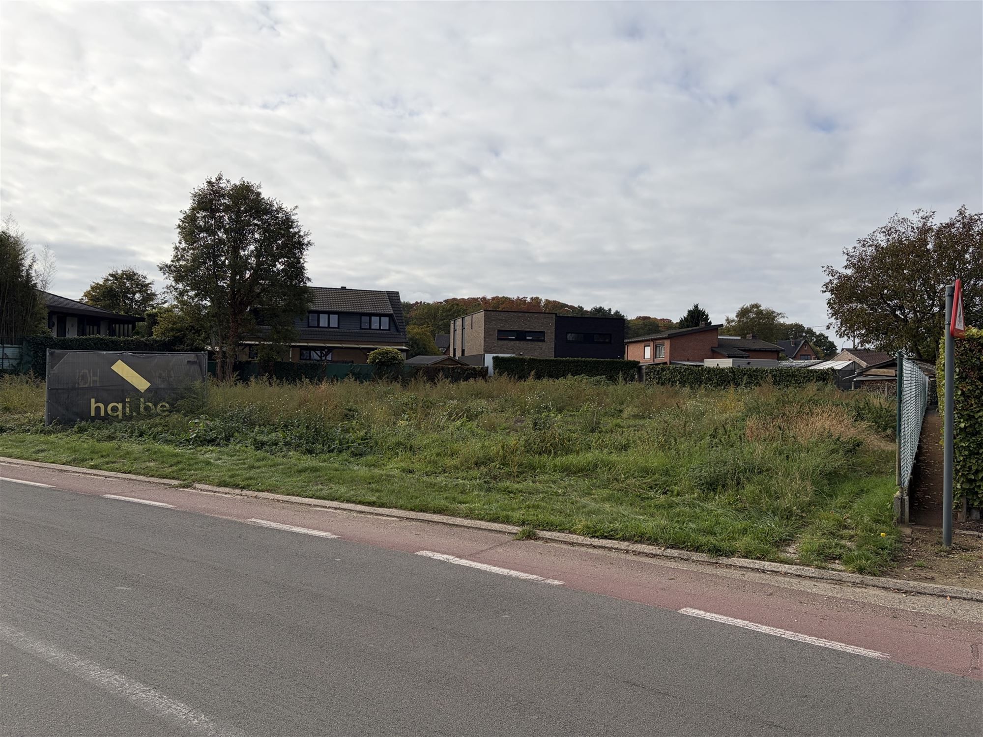 BOUWGROND VAN 6A47CA VOOR OPEN BEBOUWING MET STRAATBREEDTE VAN MAAR LIEFST 18M NABIJ PAAL-DORP foto {{pictureIndex}}