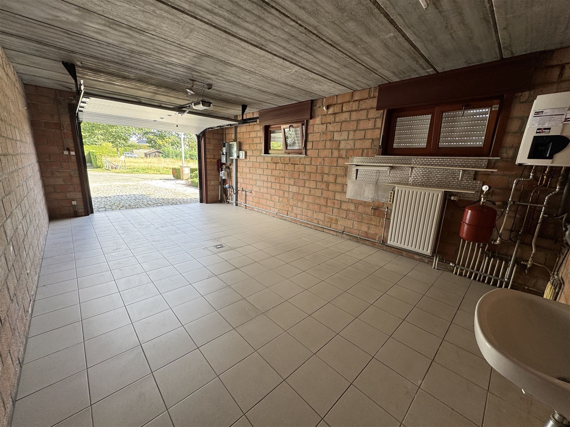 GOED ONDERHOUDEN GELIJKVLOERSE WONING MET 2 SLAAPKAMERS EN LEUKE VERANDA TE HAM foto 15