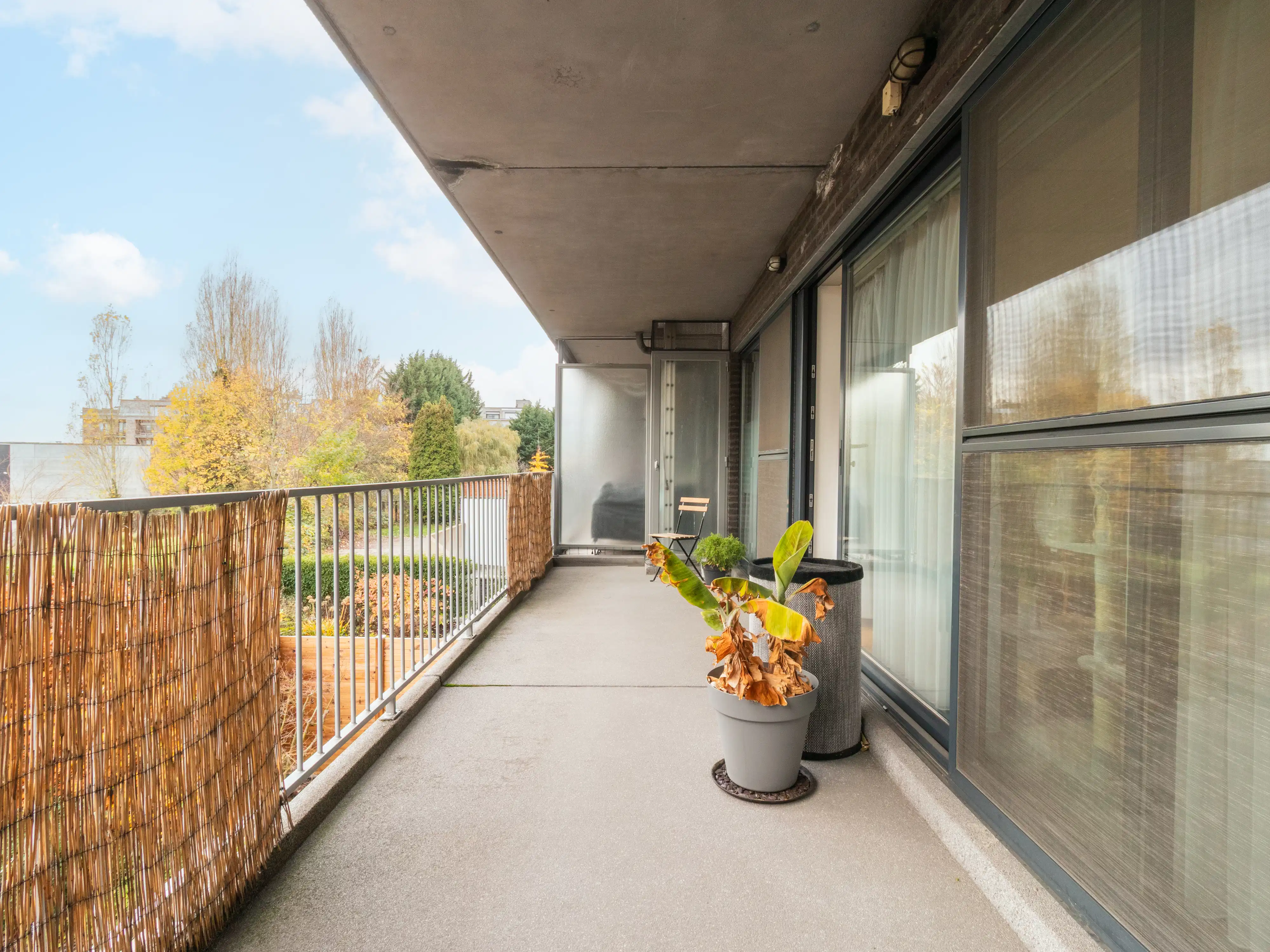 Ruim duplexappartement met garagebox en tuin foto 12