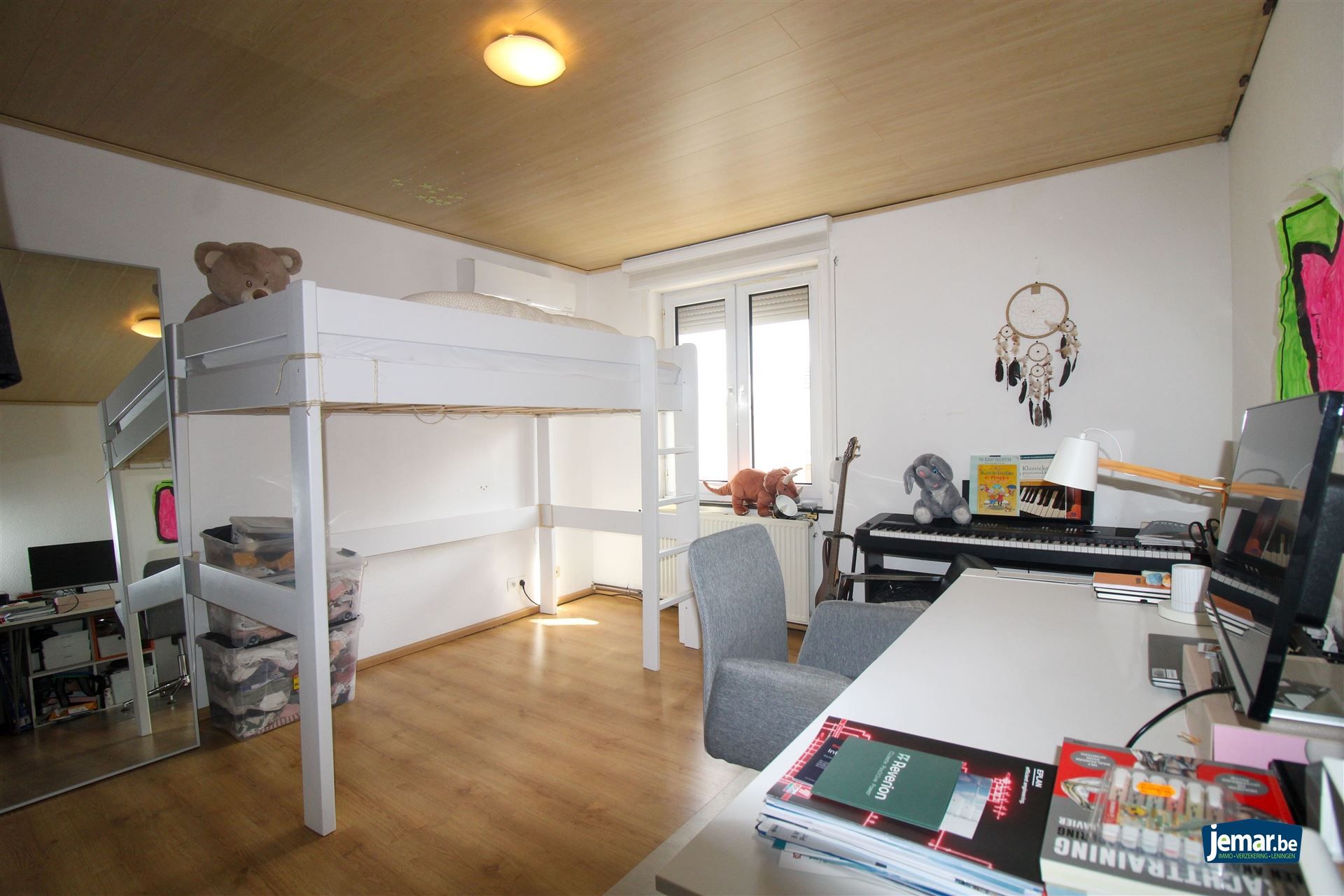 Starterswoning met 2 slaapkamers, zonnepanelen en garage in het hart van Kotem! foto 7