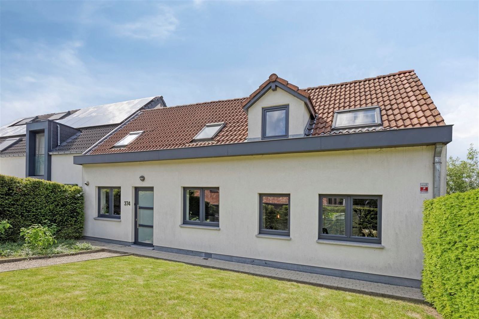 Instapklare, rustig achterin gelegen 3-gevelwoning nabij Hallerbos! foto 14