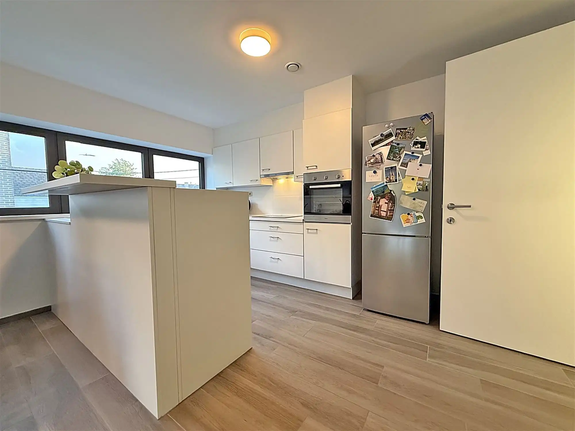 Recent, instapkl. APPARTEMENT met 2 slpks, terras & ruime garage foto 4