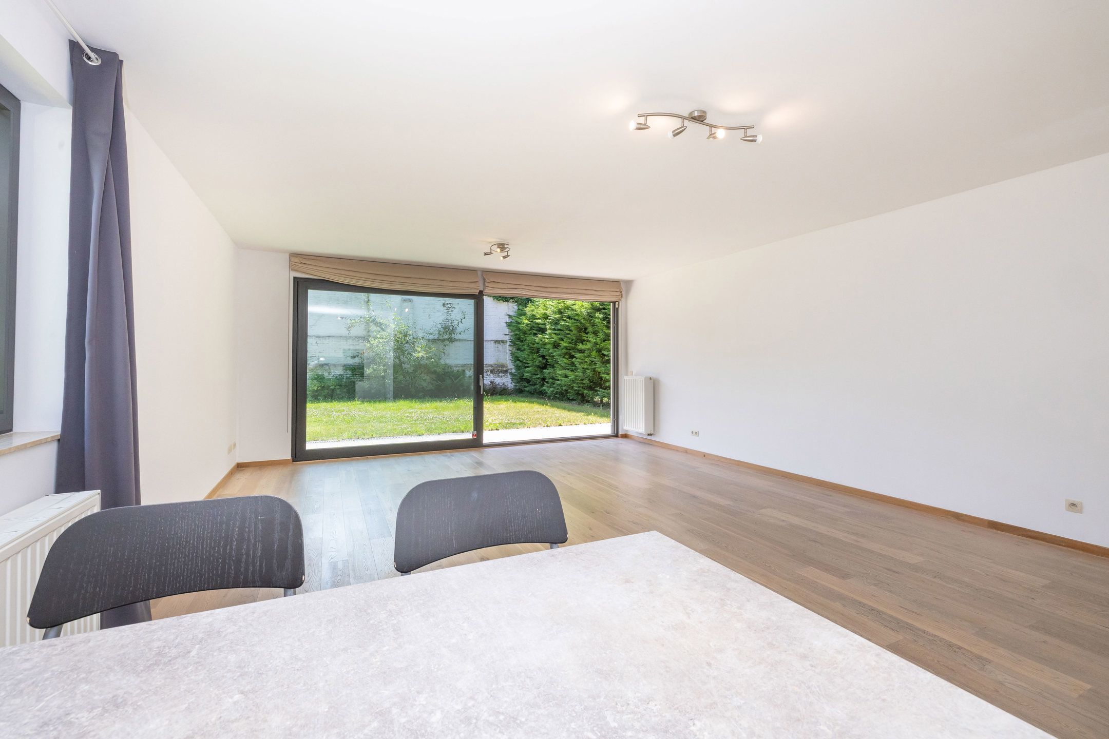 Appartement 3 slaapkamers ± 130 m² + tuin ± 200 m² + parkeerplaats foto 4