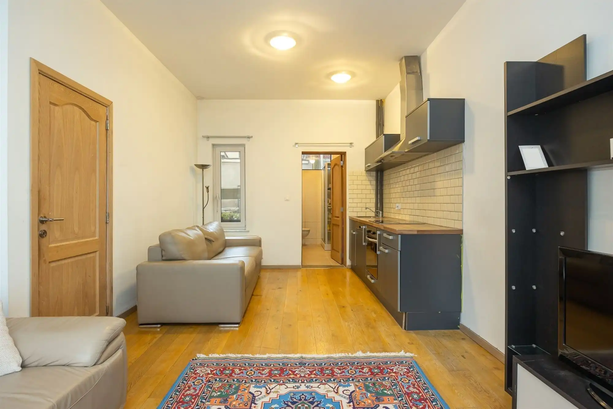 Instapklare woning met 2 à 3 slaapkamers en stadskoer foto 3