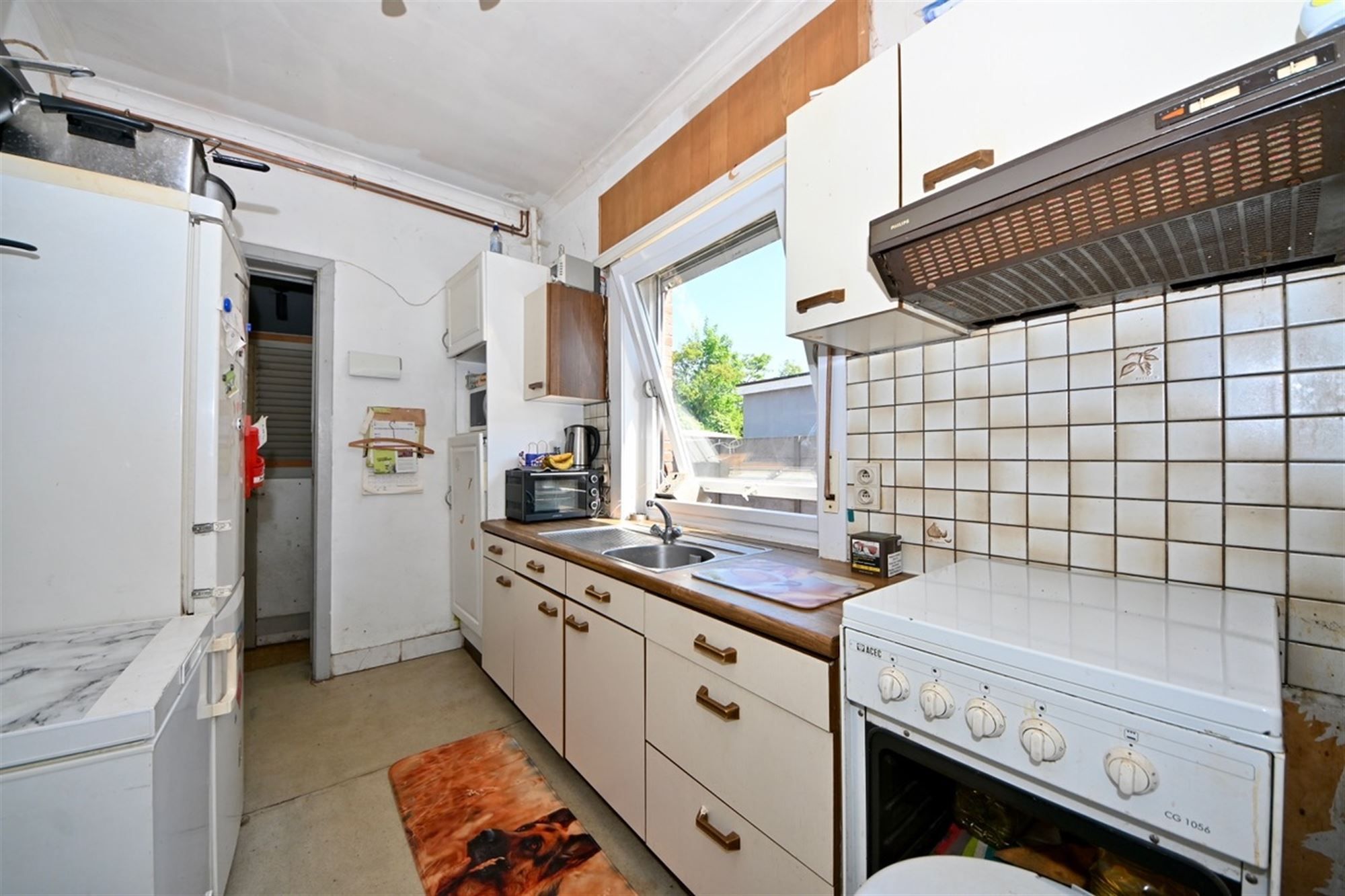 Te renoveren woning met 3 slaapkamers, garage en tuin.  foto 8