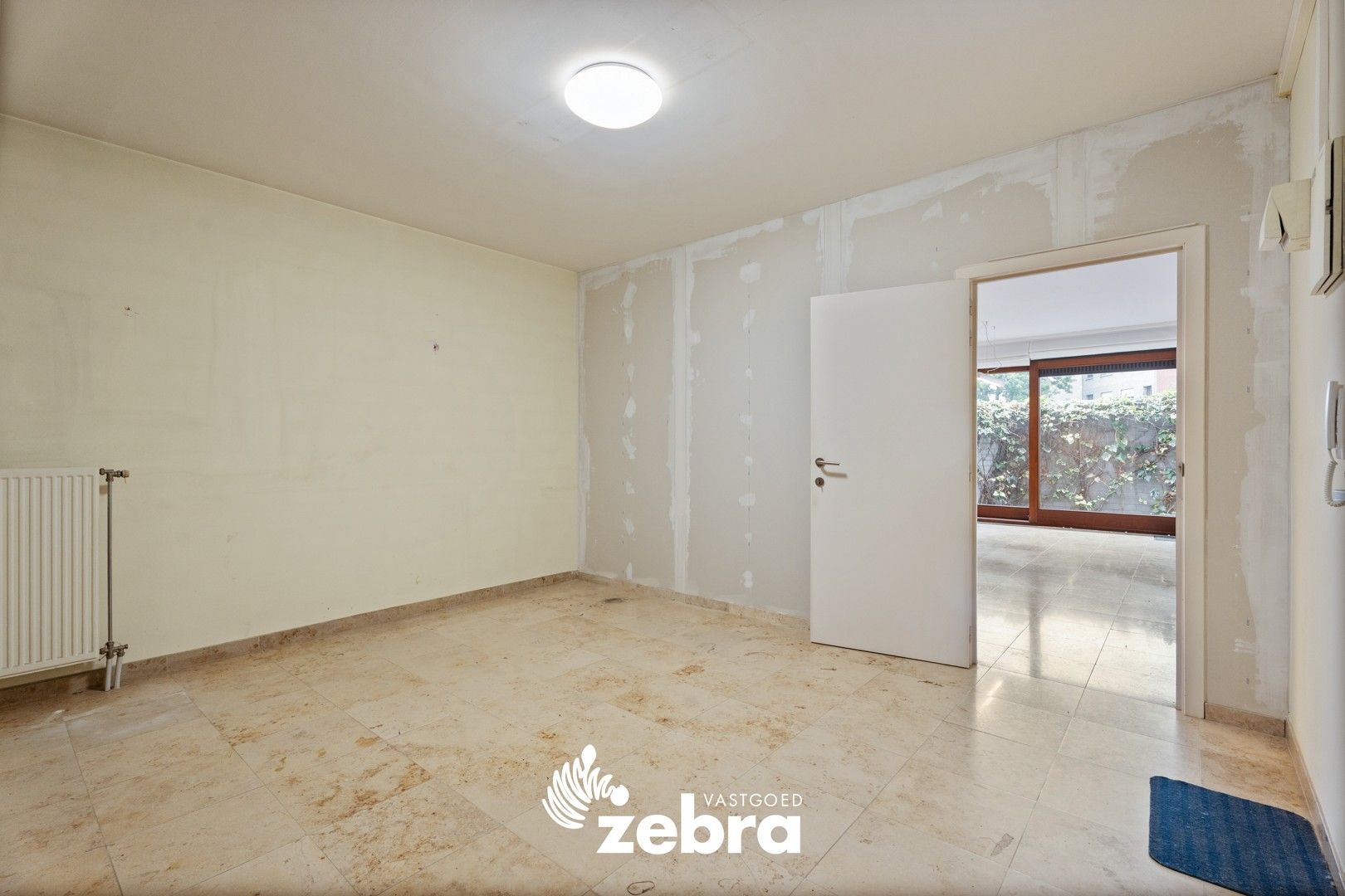 Veelzijdig handelspand op toplocatie in hartje Tielt – ook in te richten als woonst! foto 4