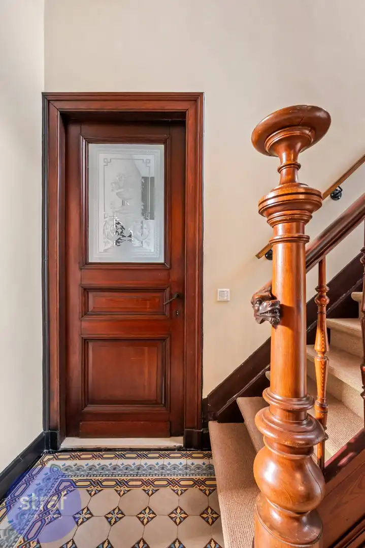 Karaktervolle woning met hoge plafonds en 2 garageboxen foto 11