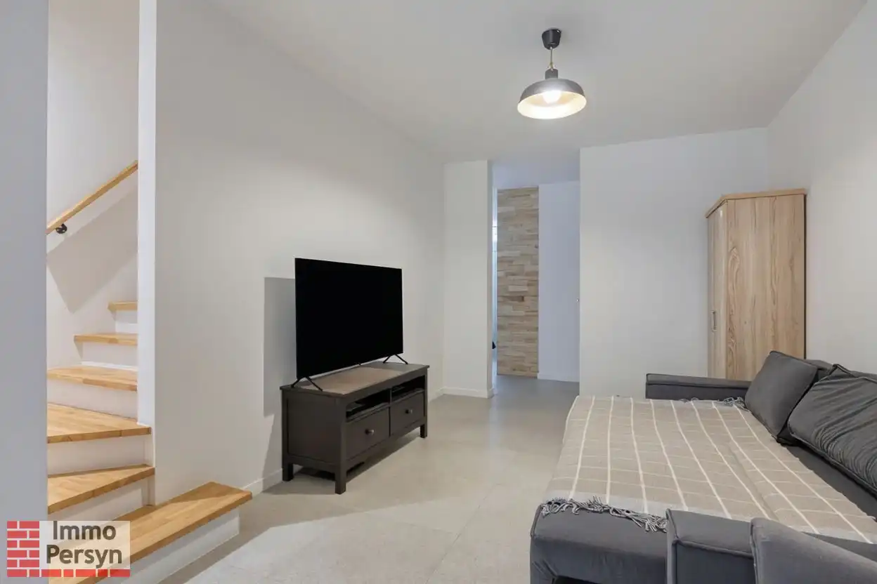 Moderne gezinswoning met 3 slaapkamers en gezellige tuin foto 9