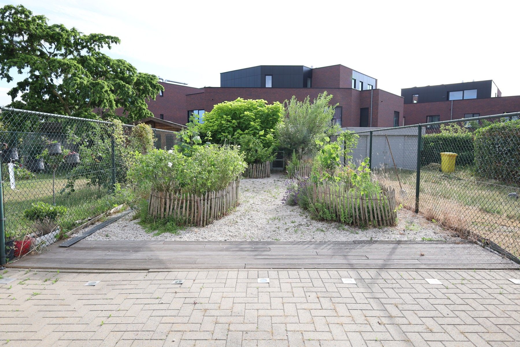 Gelijkvloers appartement met tuin, binnenautostaanplaats en kelder foto 17