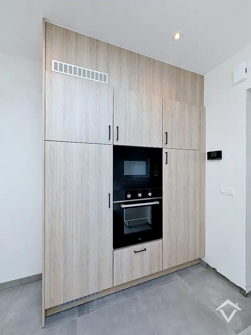 Centraal gelegen nieuwbouwwoning met 3 slaapkamers, tuin en overdekte autostaanplaats foto 9