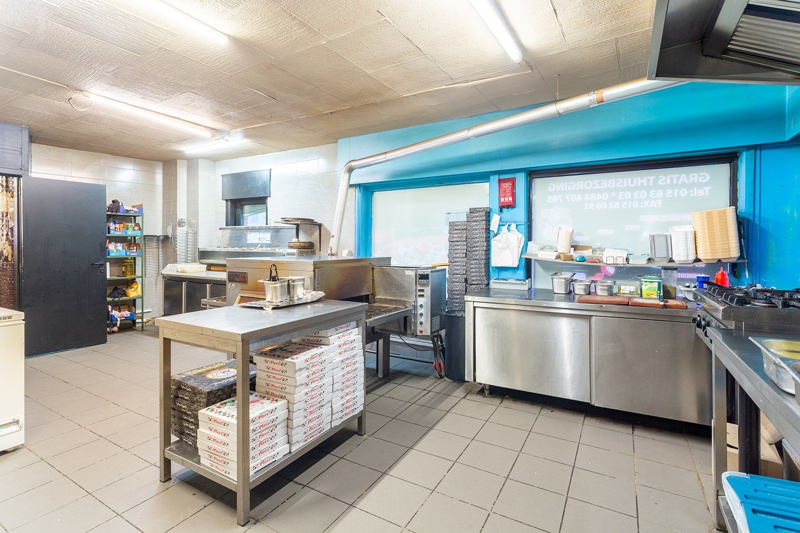Handelspand met duplex appartement en garage op toplocatie foto 8
