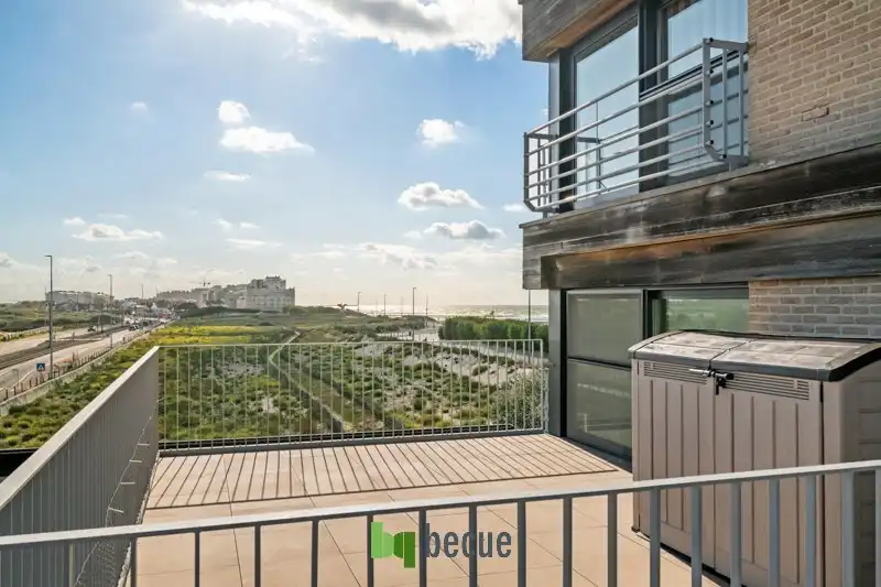 Studio met ruim zonnig terras van 16m², duinenzicht alsook zicht op de Rotonde en zee! foto 4