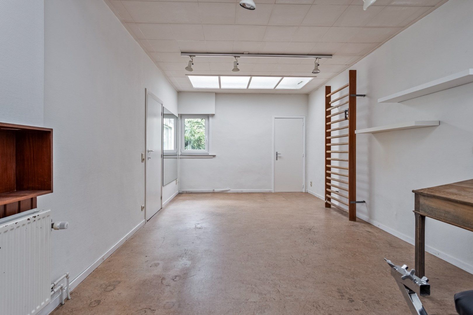 Veelzijdig handelshuis met woonst in hartje Ekeren foto 5