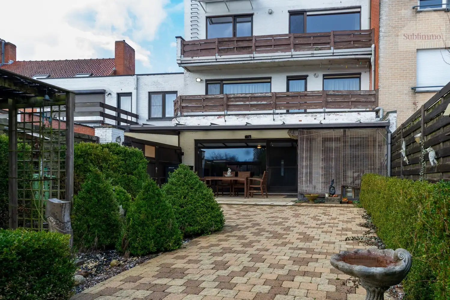 Opbrengsteigendom met 2 appartementen, tuin en garages te koop in Mol centrum foto 34