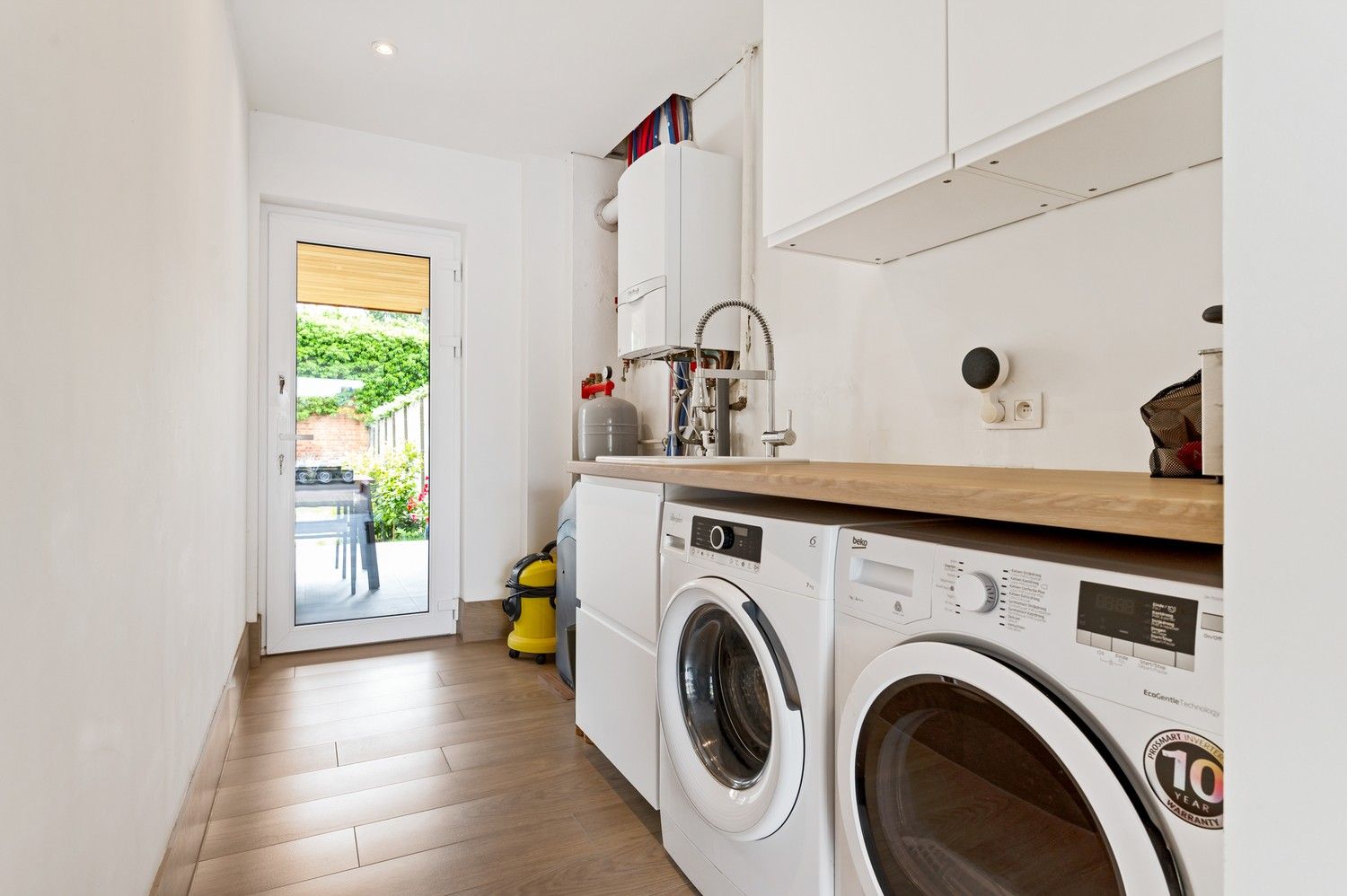 Energiezuinige woning met 3 slaapkamers, 2 badkamers,  garage en tuin in Schoten! foto 4