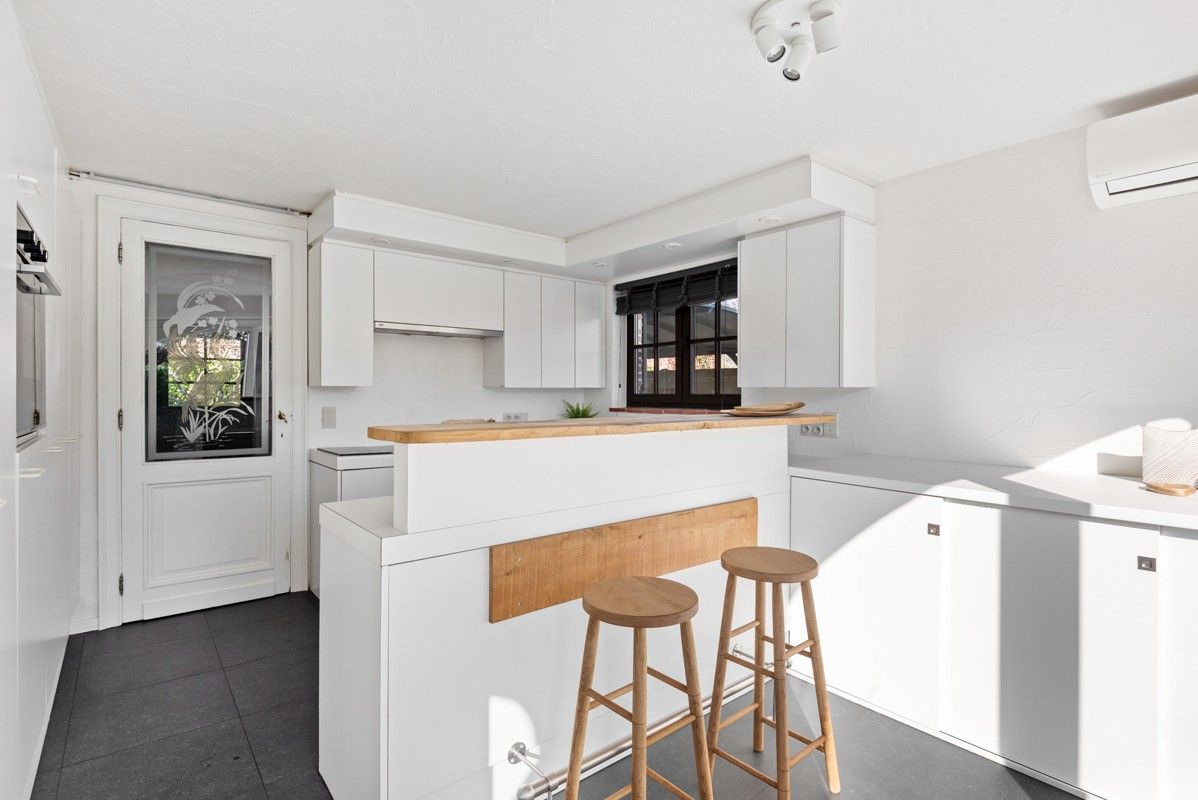 Super charmante woning met 2/3 slaapkamers in een doodlopende straat vlakbij het centrum van Schilde. foto 6