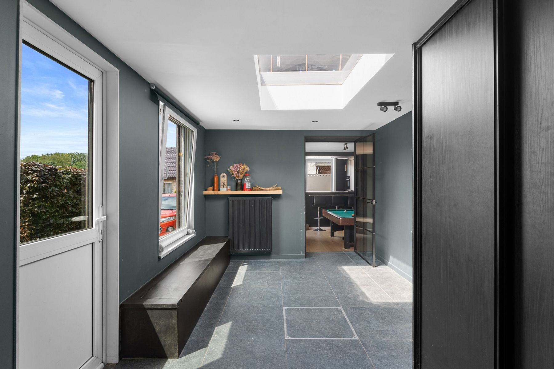 Instapklare halfopen woning met ZO-tuin én garage in Melsen! foto 8