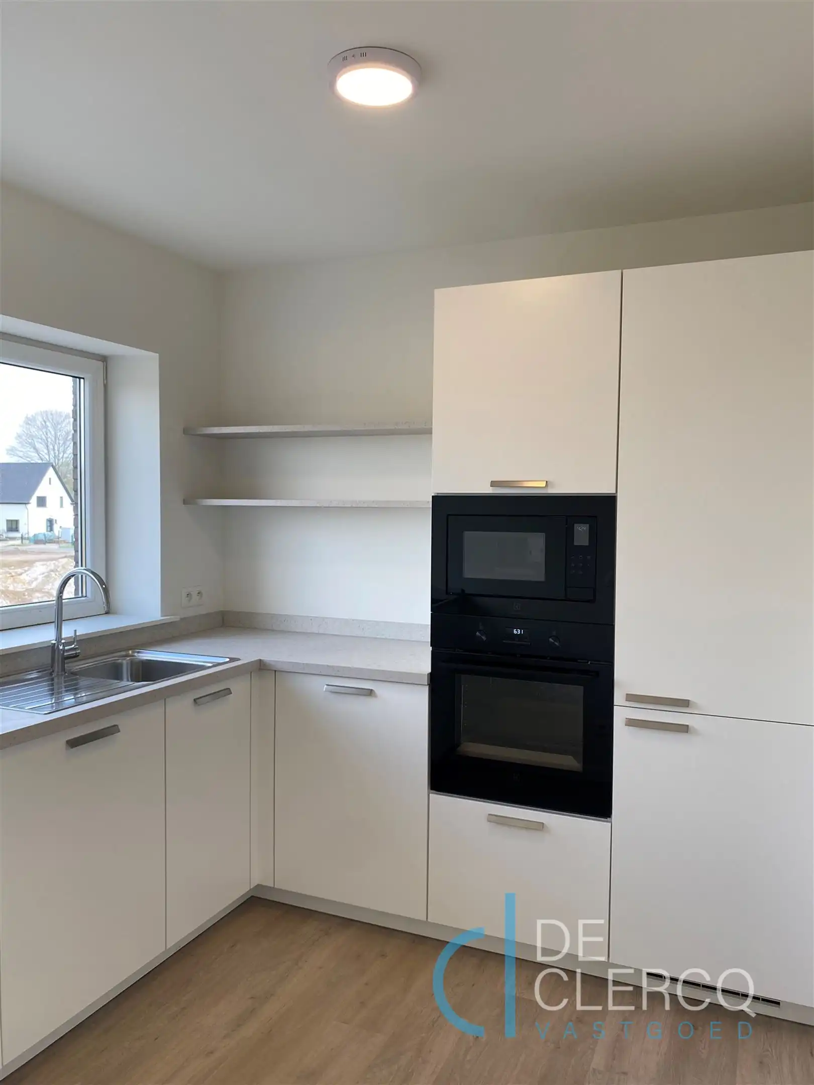 Modern gerenoveerd appartement te huur centrum Zelzate!  foto 5